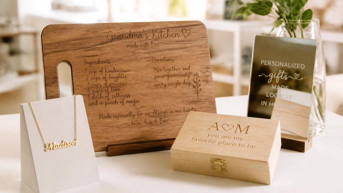 Polished editorial scene of The Heartcrafted Shop’s personalized gold name necklace, engraved wooden serving board, engraved