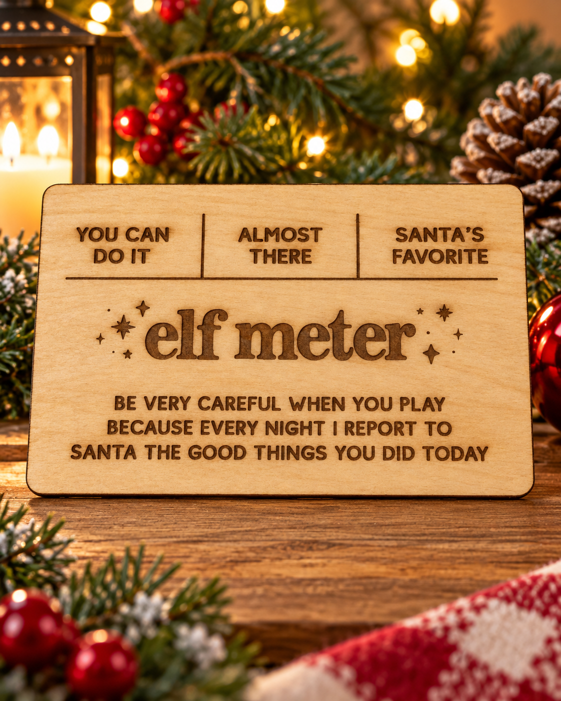 Festive lifestyle concept of laser-cut wooden Christmas Helper prop; original product photograph shows exact engraving and shape