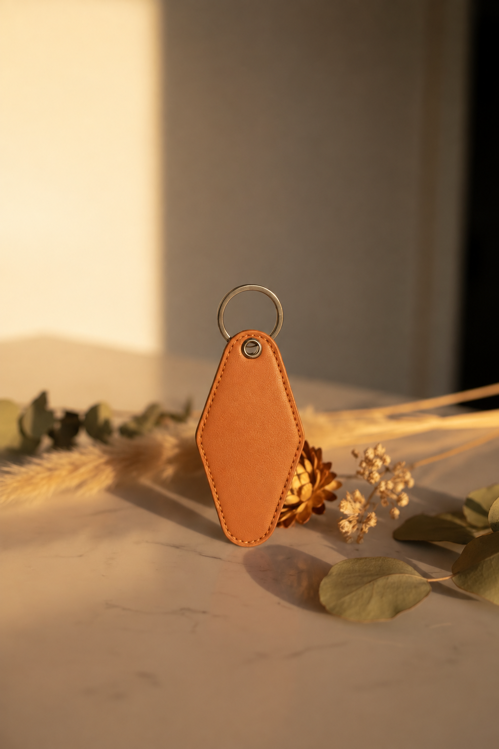 Blank orange motel keychain ready for personalization