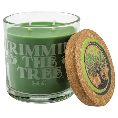 Personalized laser-etched glass candle with green wax and custom business name etching
