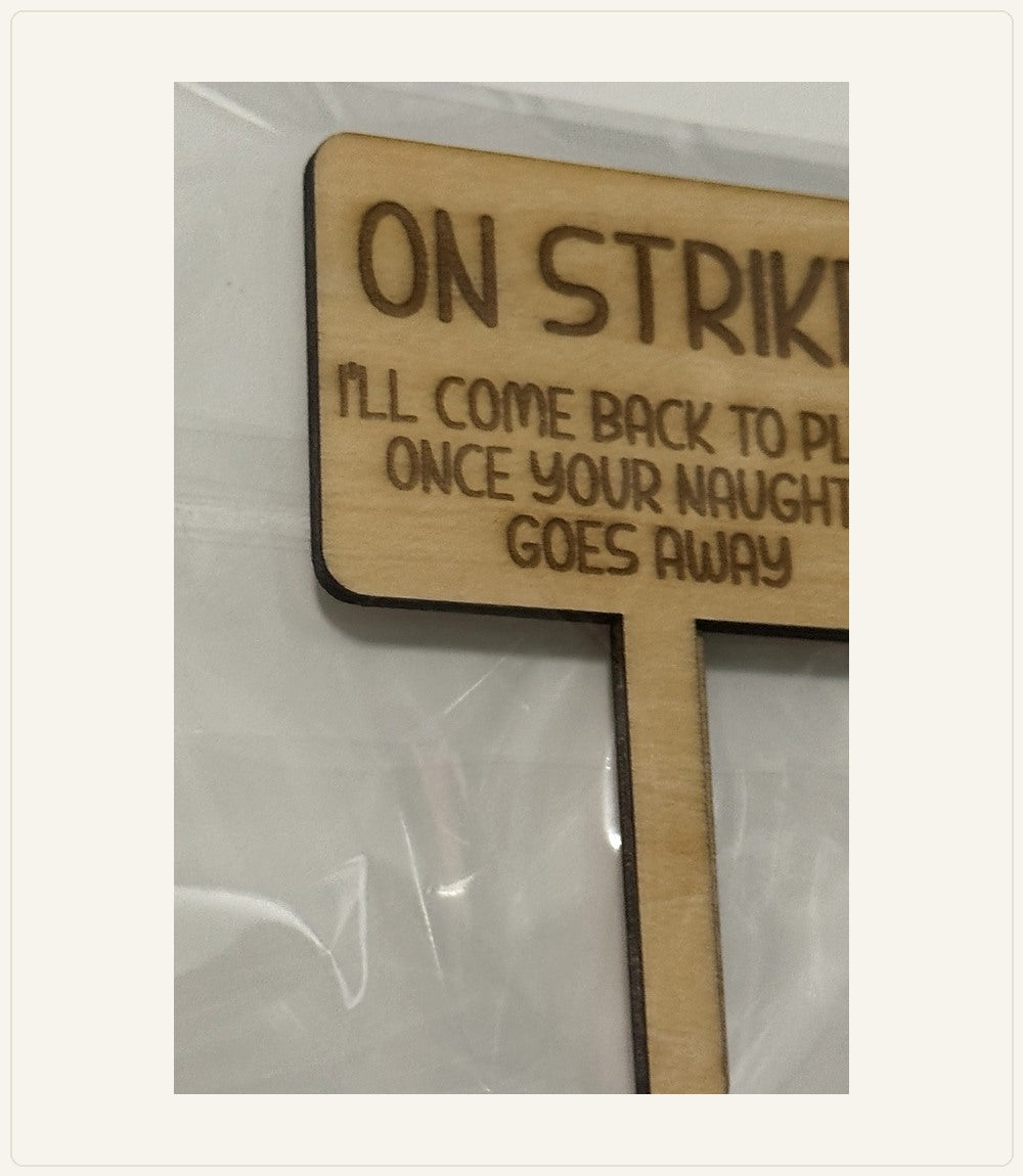 Authentic engraved wood product photograph: On Strike: Back to Play — Christmas Helper Sign
