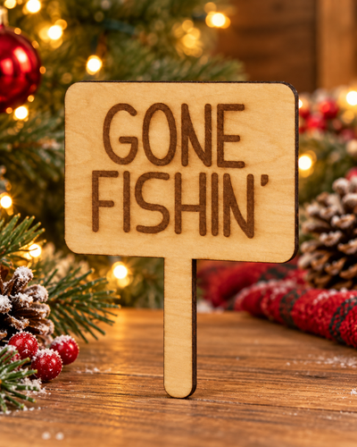 Festive lifestyle concept of laser-cut wooden Christmas Helper prop; original product photograph shows exact engraving and shape