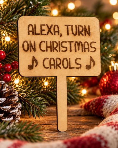 Festive lifestyle concept of laser-cut wooden Christmas Helper prop; original product photograph shows exact engraving and shape