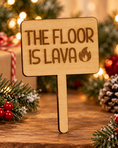 Festive lifestyle concept of laser-cut wooden Christmas Helper prop; original product photograph shows exact engraving and shape