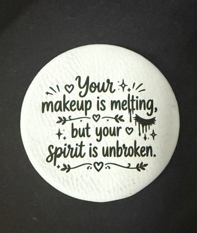 Round engraved compact mirror that reads Your makeup is melting but your spirit is unbroken