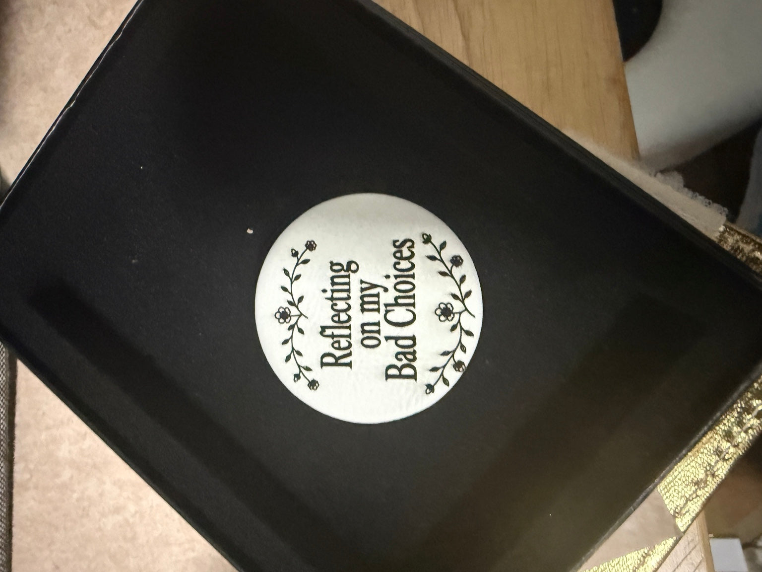Round engraved compact mirror that reads Reflecting on my Bad Choices